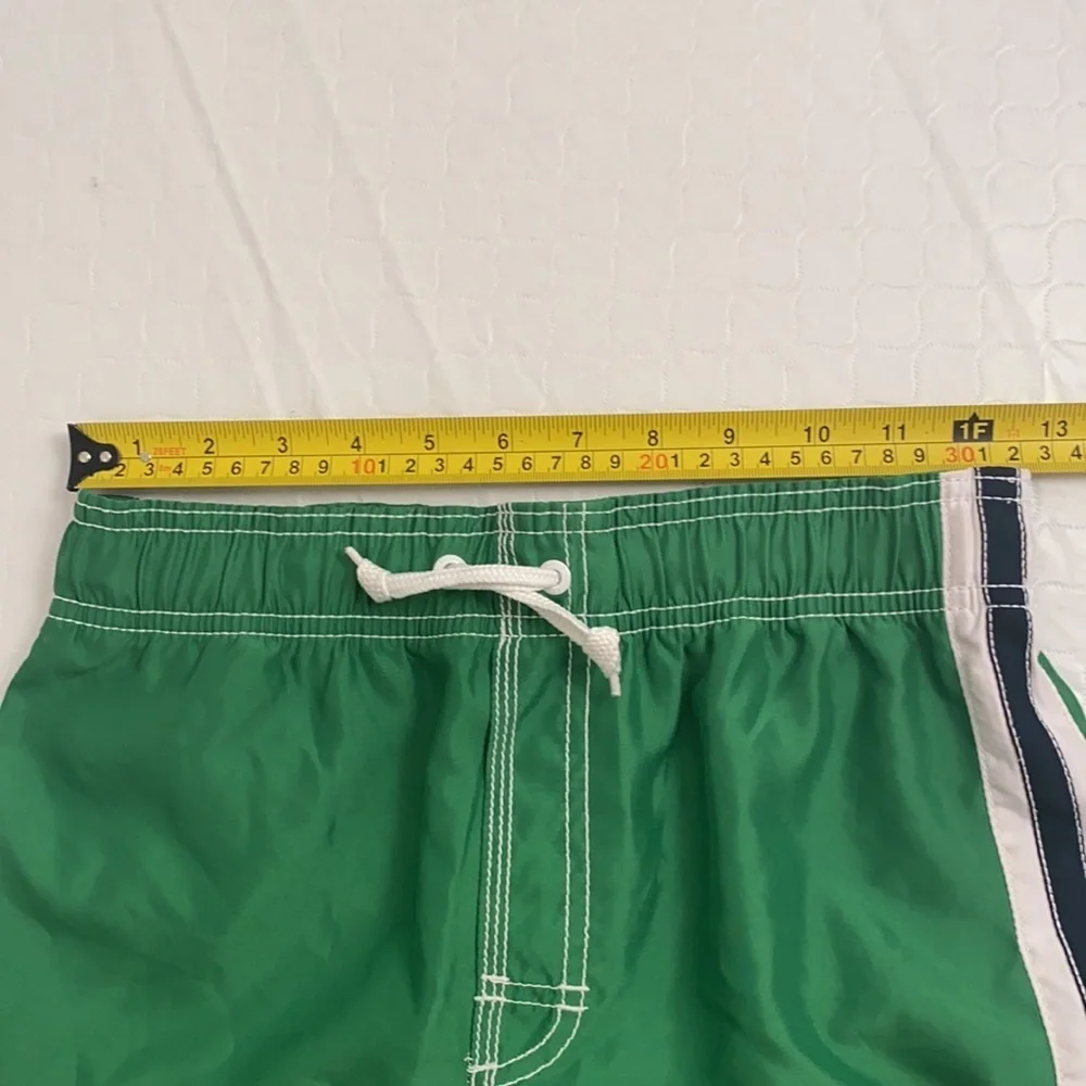 Old Navy green and white swim trunks with pockets